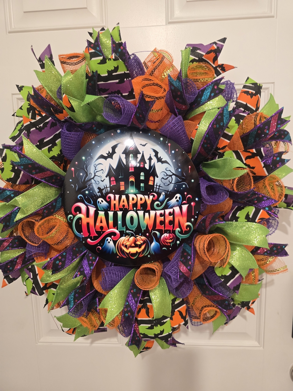 W173 – Happy Halloween Haunted House Wreath
Handmade Halloween wreath featuring